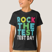 Rock The Test Testing Day Staar Motivational Teach Tシャツ (正面)
