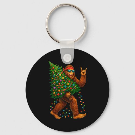 Rockin Christmas Bigfoot Carrying Tree Fun Xmas Ro キーホルダー (正面)