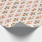 Rolled pink floral wrapping paper with a repeated  ラッピングペーパー (角)