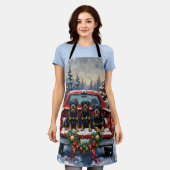 Rottweiler Christmas Red Truck Holiday エプロン (着用した状態)