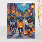 Rottweiler Trick-or-Treating In Halloween Costumes カード (黄色い花)
