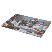 Rough Collie Running in Snow with Christmas Hat カッティングボード (角)
