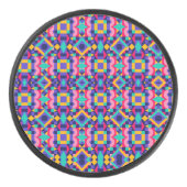 Round object with a vibrant geometric pattern アイスホッケーパック (正面)