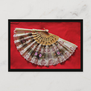 RSVP Hand 華美 Held Fan on a Red Background