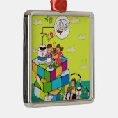 Rubikの立方体のパズルに坐っている女の子を持つ男の子 メタルオーナメント (右)