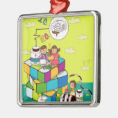 Rubikの立方体のパズルに坐っている女の子を持つ男の子 メタルオーナメント (左)