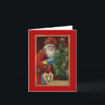 Ruby Santa Noteカード シーズンカード<br><div class="desc">赤い服をエレガント着たサンタがクリスマスの贈り物と伝統的ろうそくの灯りのついた木を届けている。休日の装飾と対応のための美しい画像である。サンタは皆に黄金のレタリングでメリークリスマスを願い、その後に輝くクリスマススターが輝く。</div>