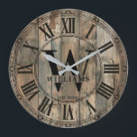 Rustic Williams Family Monogram Clock | Wood-Look  ラージ壁時計<br><div class="desc">Celebrate the Williams family legacy with this stunning rustic monogram wall clock that brings timeless elegance to any home. 🕰️ Featuring a weathered wood-look background with vertical planks, a decorative ornate border, and Roman numerals framing a bold monogram design with a large W initial, the Williams family name in classic...</div>