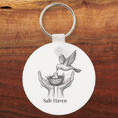 Safe Haven - 人の手の中の鳥 自然アートマーケット キーホルダー (正面)