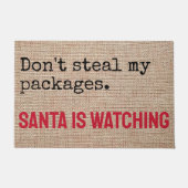 Santaが見ているパッケージを盗まないおもしろい ドアマット (正面)