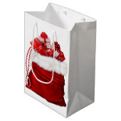 Santa Bag Full of Presents Red And White Gift Bag ミディアムペーパーバッグ (正面アングル)
