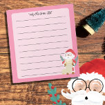 Santa Clausがリストピンクメモ帳をチェック ノートパッド<br><div class="desc">水彩サンタクロースを特徴とするかわいいクリスマスピンクのメモ帳。あなたのテキストや名前でそれをパーソナライズ。© ArianeCイラスト-All rights reserved</div>