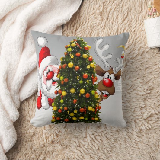 Santa claus and reindeer behind a christmas tree.j クッション (ブランケット)