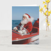 Santa Claus Delivering Gifts By Speedboat カード (黄色い花)