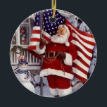 Santa Claus Holding American Flag セラミックオーナメント<br><div class="desc">Santa Claus holding the American Flag design.</div>