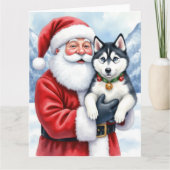 Santa Claus Holding Siberian Husky Christmas Art カード (正面)