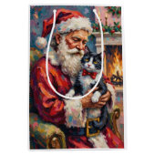 Santa Claus Holding Tuxedo Cat Christmas Art ミディアムペーパーバッグ (正面)