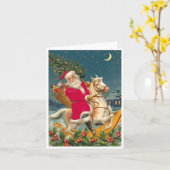 Santa Claus on a wooden horse カード (黄色い花)