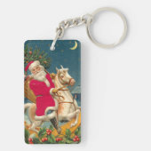 Santa Claus on a wooden horse キーホルダー (裏面)