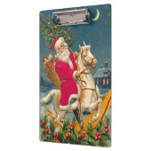 Santa Claus on a wooden horse クリップボード (左)