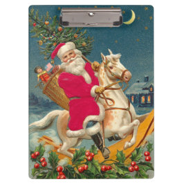 Santa Claus on a wooden horse クリップボード