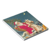 Santa Claus on a wooden horse ノートパッド (アングル)