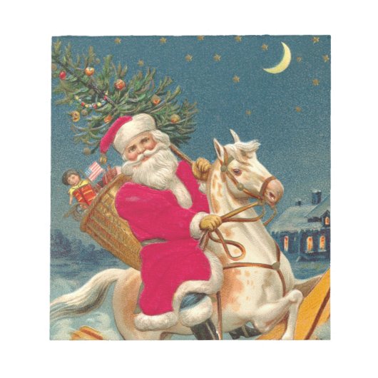 Santa Claus on a wooden horse ノートパッド (正面)