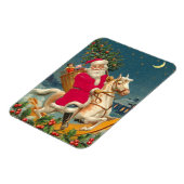 Santa Claus on a wooden horse マグネット (左側)