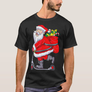 Santa Claus Riding a Push Scooter Funny Christmas  Tシャツ