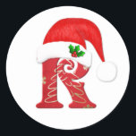 Santa hat Christmasのモノグラム文字R ラウンドシール<br><div class="desc">サンタハットとホリークリスマスステッカー付きモノグラム文字R</div>