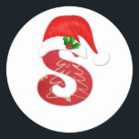 Santa hat Christmasのモノグラム文字S ラウンドシール<br><div class="desc">サンタハットとホリークリスマスステッカー付きモノグラム文字S</div>