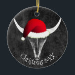 Santa Hat Christmas Ceramic Ornamとのバイソンスカル セラミックオーナメント<br><div class="desc">ブラックレザーの背景に、このサンタハットをかぶったバッファローのスカルとクリスマスツリーに西テーマを追加する。</div>