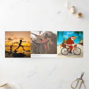 Santa on a bicycle in Tropics Holiday Photo 三つ折りカード