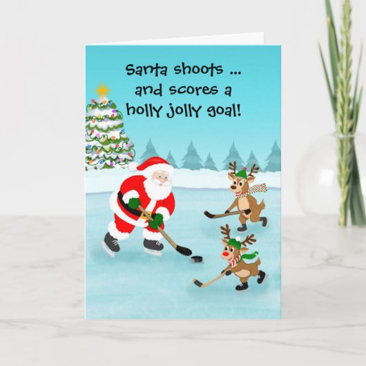 Santa Playing Hockey with Reindeer Christmas カード (正面)