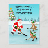 Santa Playing Hockey with Reindeer Christmas ポストカード (正面)