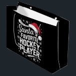 Santa's Favorite Hockey Player Pajama Christmas ラージペーパーバッグ<br><div class="desc">サンタのホッケー選手パジャマお気に入りのクリスマスプレゼント</div>