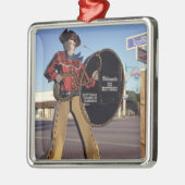 Scottsdalへのカウボーイの姿の印の歓迎する観光客 メタルオーナメント (左)