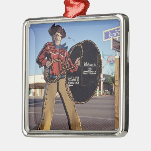 Scottsdalへのカウボーイの姿の印の歓迎する観光客 メタルオーナメント (左)