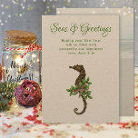 Sea Horse Rustic Seas and Greetings Christmas Card シーズンカード<br><div class="desc">Christmas sea horse flat greeting card on kraft paper. “Seas and Greetings” can easily be changed to your choice of greeting. Beneath the green script, add a short message with a signature. A brown sea horse is decorated with green holly leaves and a little sea star. A beach scene is...</div>