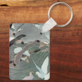 Seagulls Over Ocean Waves by Louis Agassiz Fuertes キーホルダー (裏面)