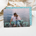 Seas and Greetings | Nautical Holiday Photo Card シーズンカード<br><div class="desc">Send holiday greetings to friends and family in nautical style with these coastal chic holiday photo cards. Design features your favorite photo with "seas and greetings" overlaid in vibrant aqua hand sketched lettering. Personalize with your names, custom greeting (shown with "Merry Christmas") and the year. Cards reverse to a white...</div>