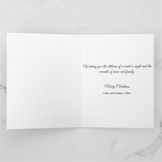 Serene snowy landscape illuminated by lit trees カード (内部)