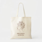 She Rises. Always — Minimalist Empowerment Design トートバッグ (正面)