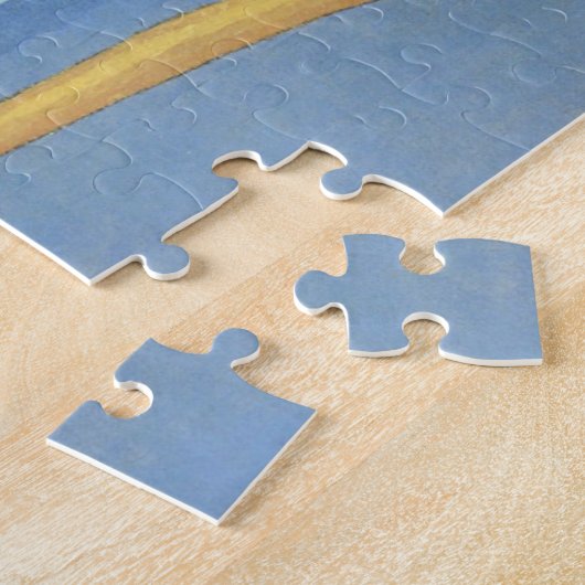 「Shoreのために先頭に立たれる舷外浮材付きのカヌーの人 ジグソーパズル (側面)