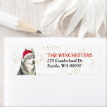 Siberian Husky Santa Hat Address Label ラベル<br><div class="desc">The left side of these return address labels features a beautiful Husky Dog wearing a red and white Santa Claus hat. Gold confetti gives a subtle sparkle to the background.  Your custom text is in red and black at the right.</div>