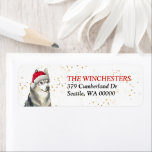Siberian Husky Santa Hat Address Label ラベル<br><div class="desc">The left side of these return address labels features a beautiful Husky Dog wearing a red and white Santa Claus hat. Gold confetti gives a subtle sparkle to the background.  Your custom text is in red and black at the right.</div>
