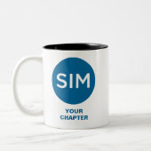 SIMチャプターのロゴとタグラインのティール（緑がかった色） ツートーンマグカップ (左)
