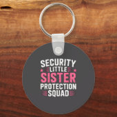 Sister Security Little Protection Squad Humor キーホルダー (正面)