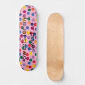 Skateboard mit bunten Punkten und rosa Hintergrund スケートボード (正面)