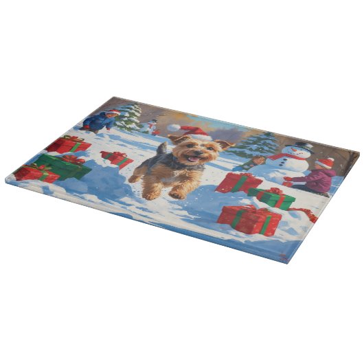 Skye Terrier Running in Snow with Christmas Hat カッティングボード (角)